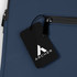 A navy blue soft-touch laptop sleeve featuring a zippered pocket and a branded tag.