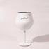 A white Shiraz detachable wine glass with a black interior and a stand, featuring a logo.