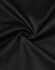 A close-up of black sustainable poly/cotton fabric, showing its smooth texture and stretch ability.