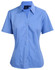 A light blue short sleeve button-up shirt with a fitted design and a branded label.