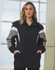 A black jacket with grey accents and a hood, featuring a front zipper and pockets, and includes a logo.