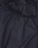 A black textured fabric featuring mesh detailing, part of a men's sustainable insulated puffer jacket.