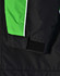 A unisex jacket in black with green accents and a Velcro cuff detail. Features branding on the material.