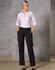 Women's low rise pants in wool stretch, featuring a black colour. Model wearing a light pink shirt and standing confidently.