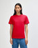 A red heavyweight cotton unisex t-shirt displayed on a model with curly hair, featuring a simple design.