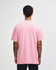A pink heavyweight cotton unisex T-shirt displayed from the back. The shirt features a logo.