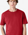 A red heavyweight cotton unisex t-shirt with a classic crew neckline, featuring a branding logo.
