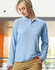A light blue unisex long sleeve polo shirt made from poly/cotton pique, featuring a collar and a logo.