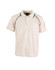 A light beige polo shirt with black piping, featuring a collar and buttons, has a logo on the front.