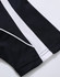A black polo shirt with white stripes along the seams and a logo on the fabric.