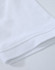 A close-up of a white cotton stretch polo shirt, showcasing the fabric and hem details. The shirt has a logo.