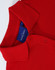 A red ladies cotton stretch polo shirt with a collar and buttons, featuring a logo inside the collar.