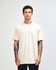 A unisex fine jersey short sleeve t-shirt in off-white, featuring a round neckline and relaxed fit.