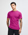 A unisex fine jersey short sleeve t-shirt in a vibrant purple colour, displayed on a model. It features a branding logo.
