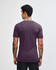 A unisex fine jersey short sleeve t-shirt in a deep purple colour, viewed from the back. It has a logo on the back.