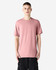A unisex CVC short sleeve t-shirt in a soft pink colour, featuring a simple design and a logo.