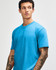 A unisex CVC short sleeve t-shirt in bright blue, featuring a relaxed fit and no visible branding.