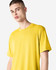 A unisex short sleeve T-shirt in bright yellow with a casual fit. The T-shirt features a logo on it.