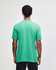 A mint green unisex short sleeve t-shirt with a plain back and a logo on the upper side.