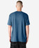 A unisex short sleeve t-shirt in a blue tone with a plain back and a logo on the label.