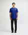 A unisex short sleeve t-shirt in blue, paired with black cargo pants, displayed on a model.