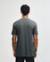 A grey unisex CVC short sleeve T-shirt displayed from the back, featuring a simple design and logo.