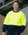 A Hi-Vis two tone safety windcheater in bright yellow and navy, worn by a man with safety glasses.