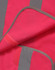 A high visibility safety vest in pink with grey shoulder reflective tapes, featuring a trim along the edges.