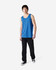 A blue tank top displayed on a model wearing black pants and sneakers, featuring a logo.