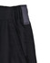 Close-up of black unisex utility stretch cargo work shorts featuring a wide waistband and a tag.