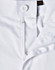A close-up view of white unisex utility stretch cargo work pants showcasing the waistband and button detail.