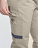 Unisex cotton stretch drill cuffed work pants in khaki with a side pocket and navy detailing.