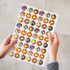A sheet featuring multiple 26mm matte circle stickers with vibrant designs in orange, yellow, and blue.