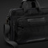 A black Swiss Peak Voyager Laptop Bag featuring multiple compartments and a detachable shoulder strap.