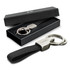 A sleek black key ring with a silver key holder, presented in a black gift box.
