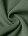 A close-up view of soft, green fabric, showcasing its texture and weave. It has a smooth, layered appearance.