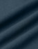 A close-up of dark blue fabric, featuring folds and a textured surface. The image has a subtle sheen.