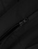 A black quilted waterproof jacket featuring a zipper detail. The fabric appears smooth and durable.