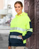 A two-tone safety hoodie in bright yellow and navy blue, featuring segmented reflective tapes and a hood.