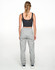 A person wearing grey unisex airlayered CVC sweatpants from a rear view, paired with a dark crop top.