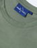 A green premium cotton short-sleeve T-shirt featuring a crew neckline and a logo label on the inside.