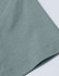 A close-up of a ladies' premium short-sleeve tee shirt in a soft green colour, featuring a smooth fabric texture.