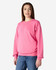 A pink Gildan Softstyle adult sweatshirt displayed on a model, featuring long sleeves and a crew neckline.