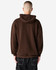 A unisex hooded sweatshirt in brown, featuring a spacious hood and a relaxed fit, with branding on the garment.