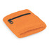 An orange wrist sweat band featuring a zippered pocket. It has a textured fabric and a small zipper.