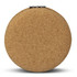 A round compact mirror with a natural cork exterior and a silver clasp.