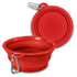 A red silicone collapsible pet bowl with a carabiner for easy attachment. Features a smooth, rounded design.