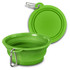 A green silicone collapsible pet bowl with a carabiner clip, displaying its expanded and folded forms.