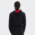A black unisex hoodie with a red inside hood, featuring a logo on the back.