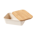 A natural lunch box with a cream body and a bamboo lid, featuring an eco-friendly design.